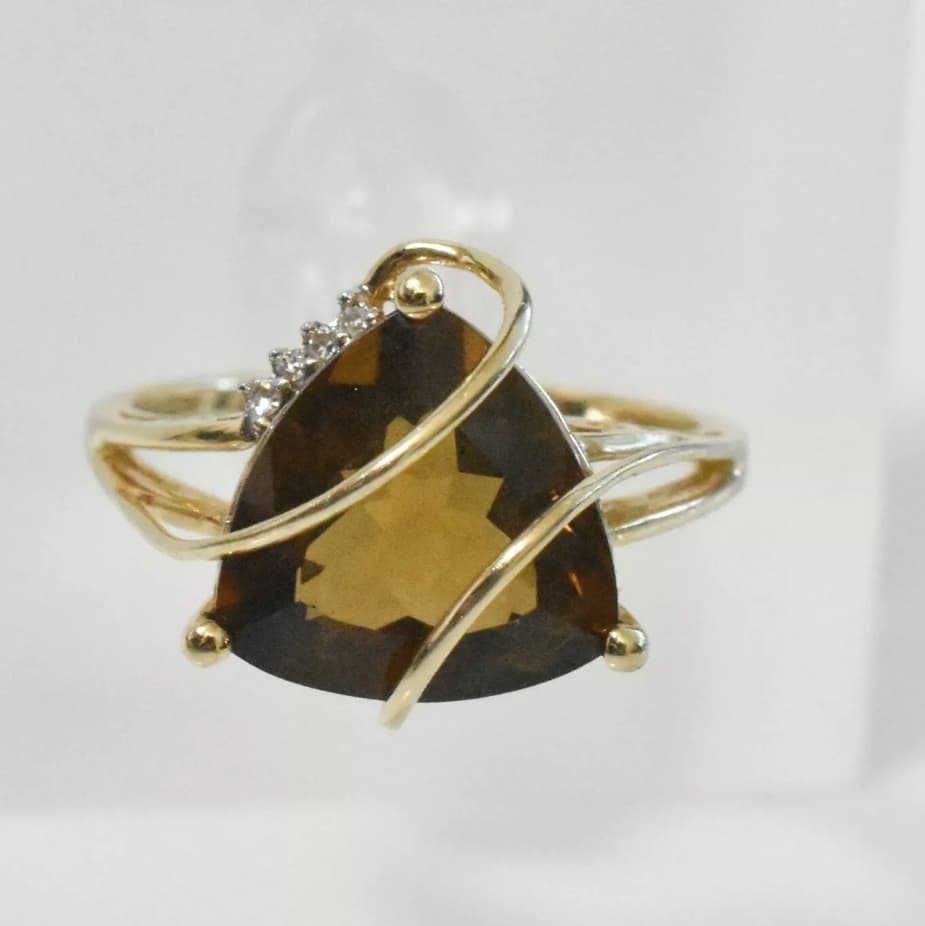 Cash 4 Gold B & T Metals carries so many different types of jewelry including gold rings with diamonds and citrine in them. 